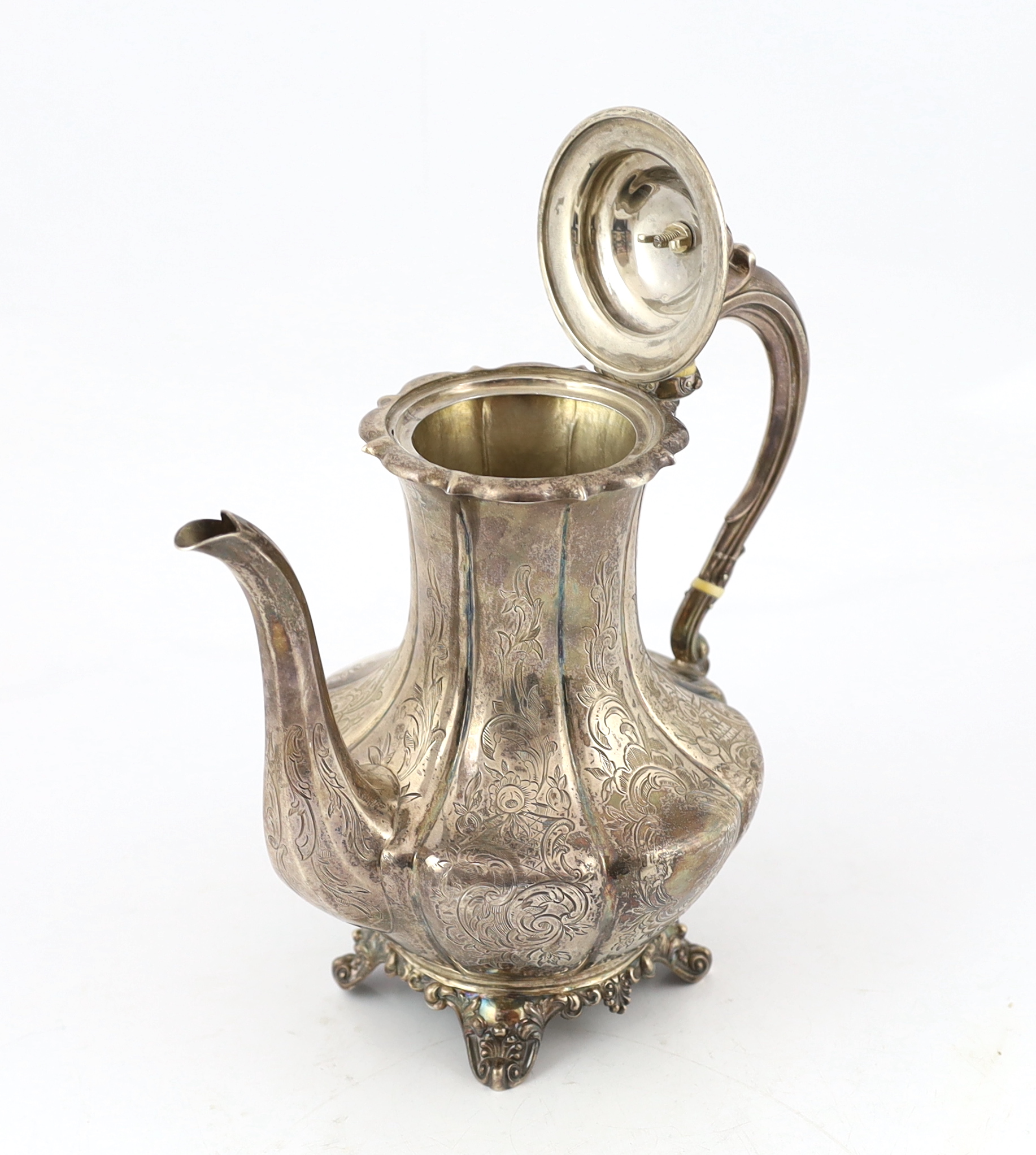 A Victorian engraved silver melon shaped coffee pot and cover with melon finial, by William Hunter, CITES Submission reference Y1TEMWCY